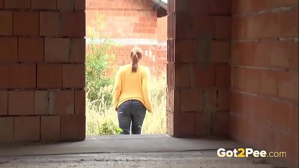 Blonde teen pisses on a building site to relieve pee desperation