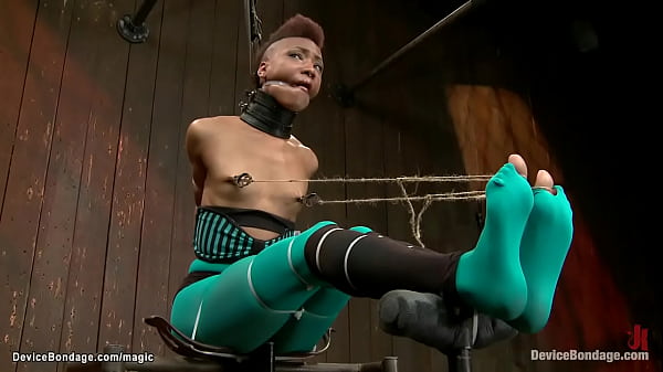 Ebony slave bound and spanked